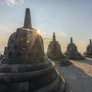 Borobudur temple at sunrise, stupas Borobudur temple at sunrise, stupas