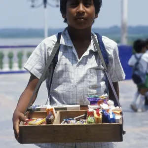 Boy with belly shop selling sweets in Iquitos Boy with belly shop selling sweets in Iquitos