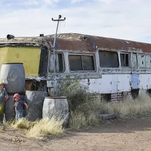 Boy and Girl Play at Bus Wreck, Patagonia Print Boy and Girl Play at Bus Wreck, Patagonia Print