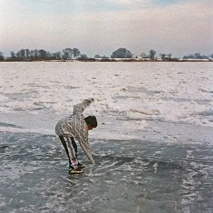 Boy on ice rink, frozen Elbe, Bleckede
