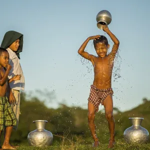 Boy washing himself, Mrauk U, Sittwe Division