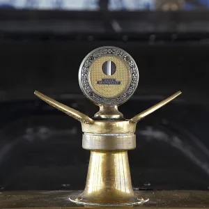 A Boyce Motometer hood ornament and radiator cap that measured the temperature of the water vapor in early cars