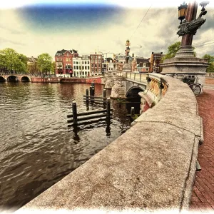 Bridge in Amsterdam with typical local architecture Bridge in Amsterdam with typical local architecture