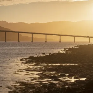 Bridge over the Gimsoy Straumen highway E6 at sunset Bridge over the Gimsoy Straumen highway E6 at sunset