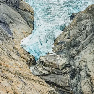 Briksdal or Briksdalsbreen glacier with melting blue ice