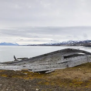 Broken wooden boat on the beach