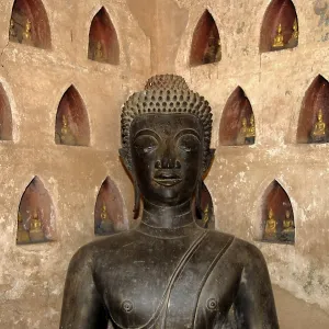 Bronze Buddha statue in a corner