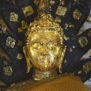 Buddha decorated with gold leaf Buddha decorated with gold leaf