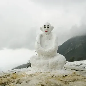 A Buddha shaped snowman, Indian snowman A Buddha shaped snowman, Indian snowman