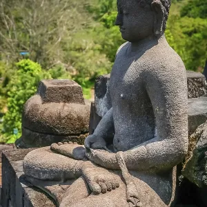 Buddha statue in Borobudur temple in Java in Indonesia Buddha statue in Borobudur temple in Java in Indonesia