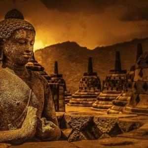 Buddha statue in Borobudur temple in Jawa in Indonesia Buddha statue in Borobudur temple in Jawa in Indonesia