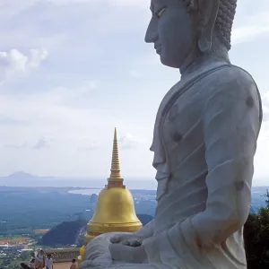 Buddha statue and chedi in Wat Tam Sua monastery Buddha statue and chedi in Wat Tam Sua monastery
