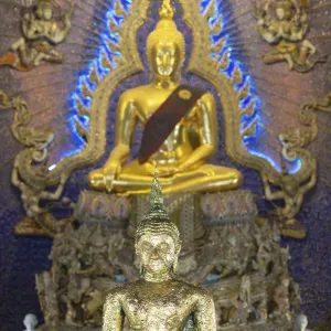 Buddha statue decorated with gold leaf Buddha statue decorated with gold leaf