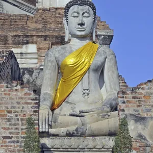 Buddha statue in front of the Great Chedi Chaya Mongkol Buddha statue in front of the Great Chedi Chaya Mongkol