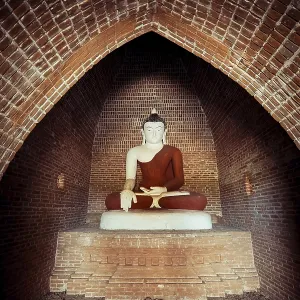 Buddha statue inside ancient Buddhist Pagoda ruins Buddha statue inside ancient Buddhist Pagoda ruins