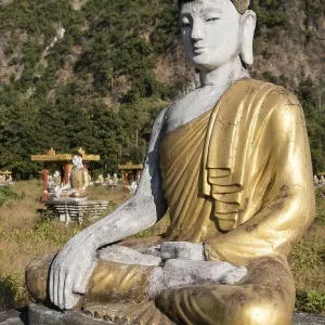 Buddha statue in Lumbini Garden under Mt Zwegabin