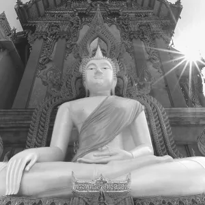 Buddha statue with tunic, Bhumispara mudra