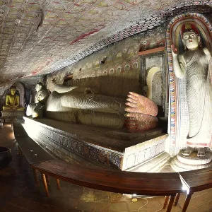Buddha statues and murals in one of the cave temples of the Golden Temple Buddha statues and murals in one of the cave temples of the Golden Temple