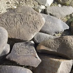 Buddhist mani stone in Ladakh, Jammu and Kashmir Buddhist mani stone in Ladakh, Jammu and Kashmir