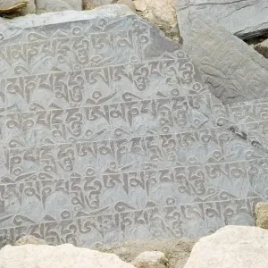 Buddhist mani stone in Ladakh, Jammu and Kashmir Buddhist mani stone in Ladakh, Jammu and Kashmir