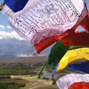 Buddhist prayer flags blowing in the wind