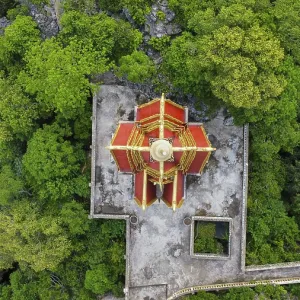 A buddhist temple on a mountain in Cambodia seen from above