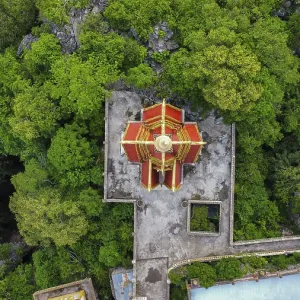 A buddhist temple on a mountain in Cambodia seen from above
