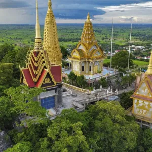 A buddhist temple on a mountain in Cambodia seen from above A buddhist temple on a mountain in Cambodia seen from above