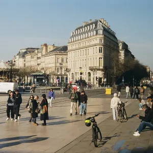 Bustling city square with historic buildings