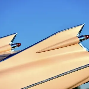 Cadillac shark fins in blue sky