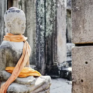 Cambodian ancient buddha statue in famous landmark angkor wat temple siem reap cambodia Cambodian ancient buddha statue in famous landmark angkor wat temple siem reap cambodia