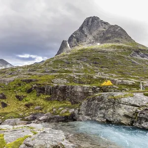 Camping in a small tent in the middle of nature in Norway Scandinavia