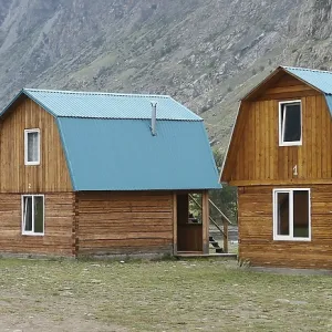 Camping wooden cabins near mountain Camping wooden cabins near mountain