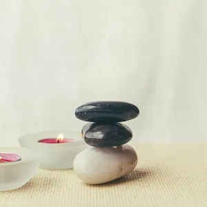 Candles pile stones