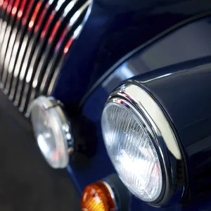 Car Lamps and Car Grille on the Front of a an Old Classic Car in Switzerland Car Lamps and Car Grille on the Front of a an Old Classic Car in Switzerland