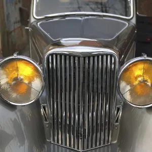 Car vintage, old Jaguar in silver color