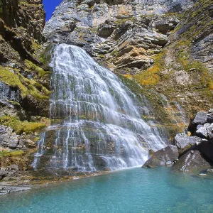 Cascada Cola de Caballo waterfall under Monte Perdido at Ordesa Valley Aragon Huesca Pyrenees of Spain