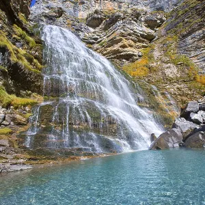 Cascada Cola de Caballo waterfall under Monte Perdido at Ordesa Valley Aragon Huesca Pyrenees of Spain