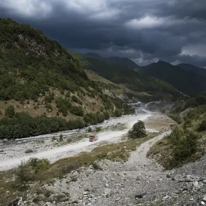 Caucasus mountain landscape on the military road in Georgia with stormy sky