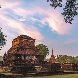 The central Buddhist temple Wat Mahathat at sunset The central Buddhist temple Wat Mahathat at sunset