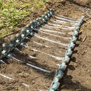 Chains of a harvester on the forest floor