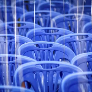 Empty chairs awaiting pilgrims coming for a Buddhist festival near Bangkok