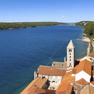 Church tower and old town of Palit by the sea