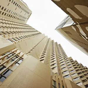 Cityscape with modern office building under sky in Hong Kong Cityscape with modern office building under sky in Hong Kong