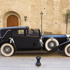 Classic car in front of the Cathedral La Seu at Palma Classic car in front of the Cathedral La Seu at Palma