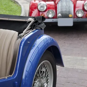 Two Classic Cars On The Road Two Classic Cars On The Road