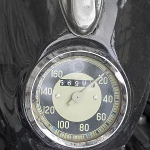 Classic vintage motorcycle speedometer at headlight Classic vintage motorcycle speedometer at headlight