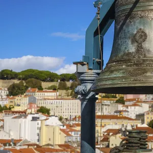 Close-up of historic bell in selective focus overlooking Lisbon