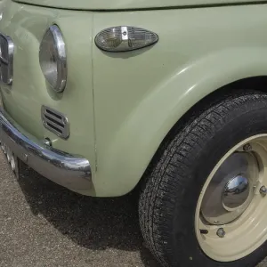 Close-up of an olive green vintage car Close-up of an olive green vintage car