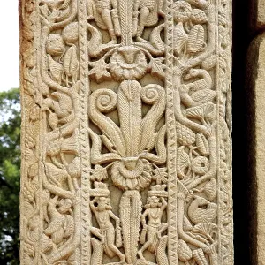 Close-up view of north gateway pillar of stupa 1 showing carving of human figures Close-up view of north gateway pillar of stupa 1 showing carving of human figures